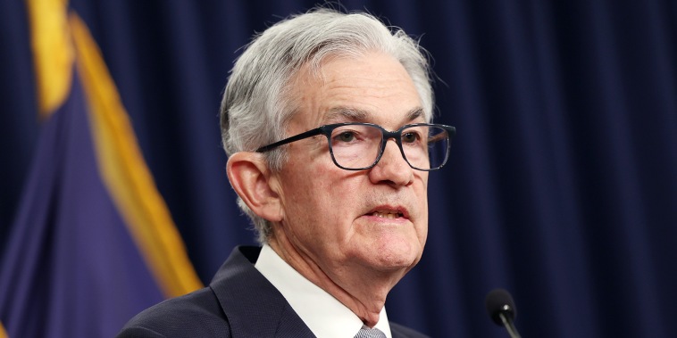  Federal Reserve holds interest rates steady as consumer confidence improves and inflation slows