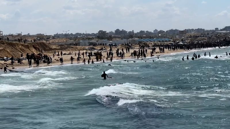  At least 12 Palestinians drown trying to retrieve aid parcels dropped into the sea