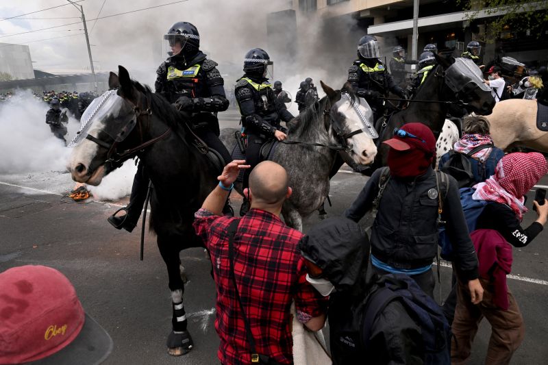  Protesters clash with police at Australia defense show