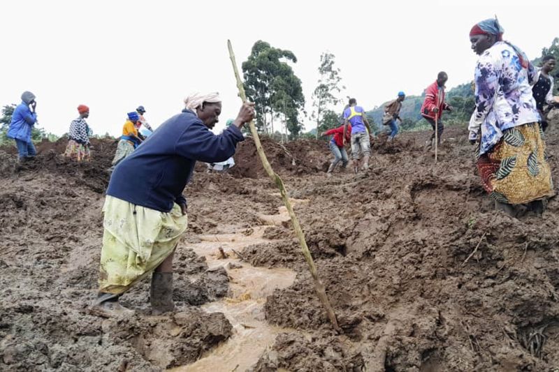  At least 15 killed and more than 100 missing after landslides bury homes in Uganda