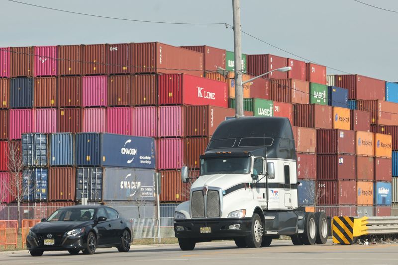  Potentially crippling port strike averted after dockworkers, ports and shipping companies reach a tentative deal