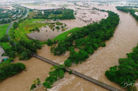 One dead, thousands evacuated as northeast Australia battles massive floods